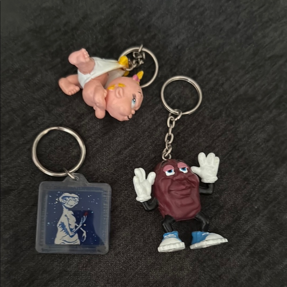 Set of 3 vintage 1980’s keychains E.T. California Raisin and baby.